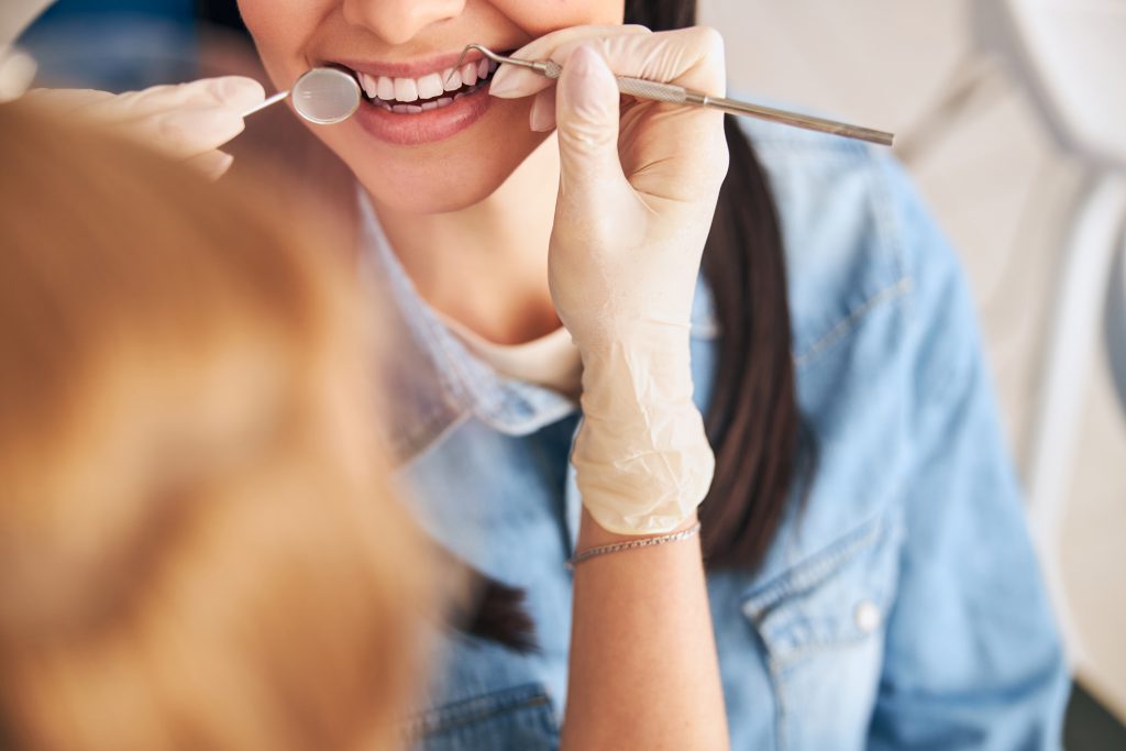 Cheerful Female Person Visiting Her Family Dentist